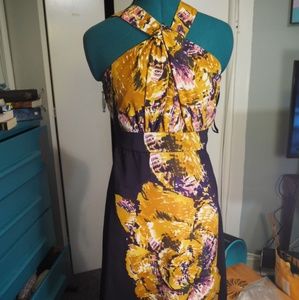 The limited purple floral halter dress size 4